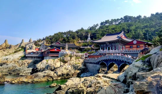 Haedong Yonggungsa Temple built on seaside cliffs overlooking the ocean in Busan