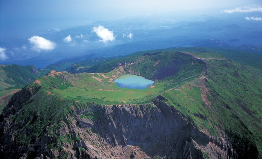 Aerial view of Hallasan Mountain on Jeju Island with Baengnokdam crater lake at the summit