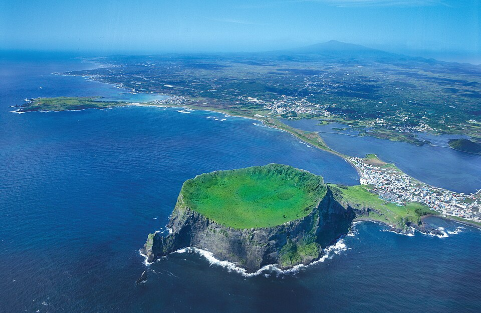 Aerial view of Seongsan Ilchulbong (Sunrise Peak), a UNESCO World Natural Heritage site on Jeju Island, South Korea